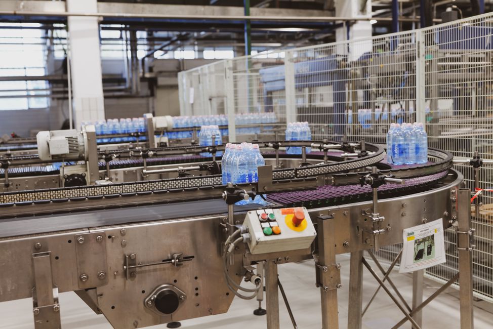 Products moving along a factory production line