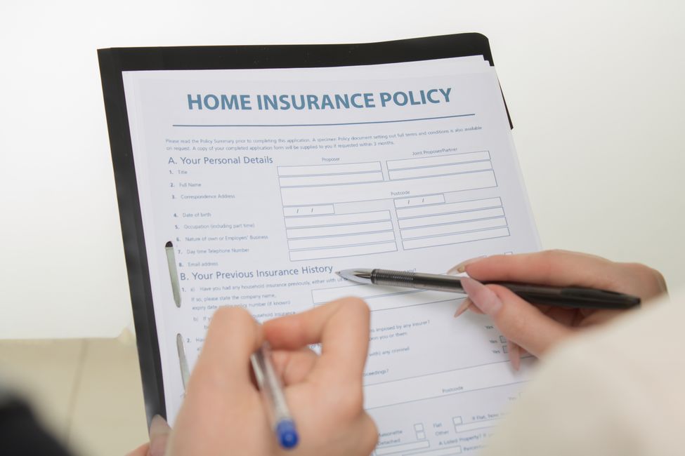 Insurance policy paperwork on a desk
